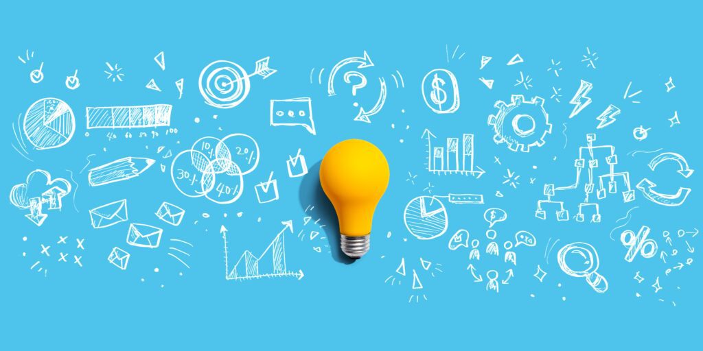 marketingstrategyconceptwithalightbulb-flatlay